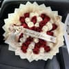 Bouquet of red and white roses with a satin ribbon