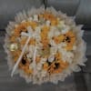 Bouquet of white and yellow roses with sunflowers and butterfly accents