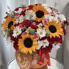 Bright, festive, and full of warmth-this Mamita Hermosa flower arrangement is a