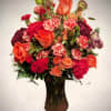 A vibrant celebration of color and life, the Sunset Radiance Vase bursts