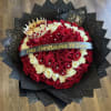 Heart-shaped bouquet of red and white roses with a crown topper