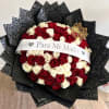 This majestic floral arrangement is an exclusive bouquet of 75 red and