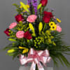 Red Dose mixed flower arrangement may not look exactly like photo may