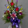 Red rose mixed flower arrangement may not look exactly like photo may