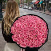 A luxurious statement bouquet featuring an abundant arrangement of premium pink roses