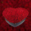 Heart-shaped box filled with red roses