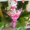 Pink bouquet with a Hello Kitty plush and ribbon wrap