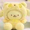 Yellow plush bear wearing a hood and bow tie
