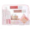Pink makeup gift set with setting spray, lip gloss, powder, and a pouch