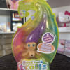 Packaged Good Luck Trolls toy with purple hair