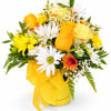 Yellow and white mixed bouquet in a yellow container with a ribbon