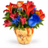 Bright mixed bouquet in a novelty Frankenstein head vase
