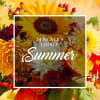 Summer floral arrangement with sunflowers, dahlias, and small white daisies