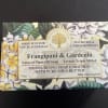 Wrapped bar of Frangipani and Gardenia soap with floral packaging