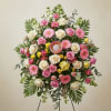Large standing floral spray with pink and white roses and gerbera daisies