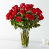 Bouquet of red roses in a clear glass vase