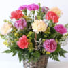 A colorful arrangement of fresh carnations in mixed shades,beautifully designed to bring