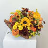 Basket arrangement with sunflowers, orange roses, and chrysanthemums