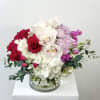 Fruit Punch Flower Arrangement &ndash; Fuchsia Roses &amp; White Hydrangea Bouquet:
Ignite joy