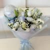 Bouquet of white and pale blue flowers with a baby boy balloon