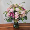Pink and white mixed bouquet in a glass vase