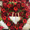 Red Sympathy Heart Wreath is a heartfelt tribute designed to express warmth