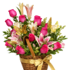 A full woven basket overflowing with bright pink roses and mixed lilies-the
