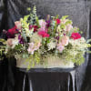 An fun and bright large floral basket, to brighten up your day.