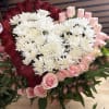 Two toned hearts made with roses on a basket  