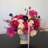 Bright and beautiful mix of roses, dahlias, anemones, allium and amaranthus 