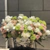 soft pink roses pop of green and white