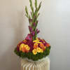 Bright beautiful spray roses on lush greens available in multiple colors 