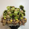 custom holiday arrangement with kiwi fruits perfectly pared with nature. 