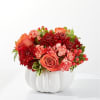 Embrace the crisp, golden energy of fall with this stunning seasonal arrangement.