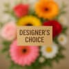 Designer’s choice bouquet with colorful gerbera daisies and a card