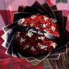 Bouquet of red roses with baby's breath and an "I Love You" ribbon