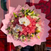 25 pink roses with a lisianthus and lily border, decorated with pearl