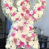 Large floral arrangement shaped like the number 50 with pink and white roses and lilies