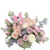 Pastel bouquet in a basket with pink butterflies
