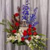 Show their unwavering dedication with our Dearly Patriotic Cremation Urn Setting. Crafted