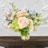 "Hand-crafted by accredited Master Florist Tricia Won (AIFD, EMC, IMF) using premium