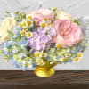 "Hand-crafted by accredited Master Florist Tricia Won (AIFD, EMC, IMF) using premium