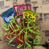 Candy bouquet with assorted snack bags and bright ribbon curls