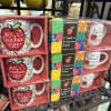 Gift mugs with teacher-themed designs in boxed sets