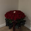 A luxurious XL basket featuring 101 premium red roses, beautifully arranged to