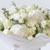Large bouquet of white roses and hydrangeas with eucalyptus