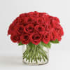 Bouquet of red roses in a clear glass vase