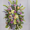This stunning funeral/memorial service standing spray is in loving memory of a