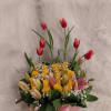 Garden of roses and tulips, beautiful floral arrangement of tulips, roses and