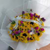 Mixed garden bouquet of tulips, sunflowers, and roses. A bouquet worthy of